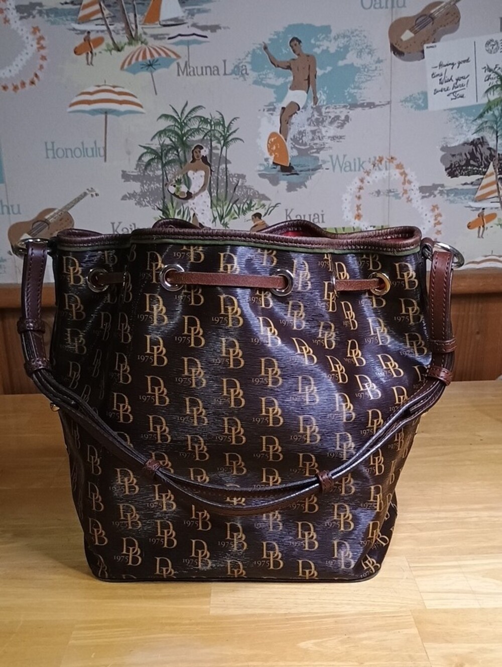 Dooney & Bourke Sutton Brown Logo Drawstring Bucket Bag with Red Interior - Picture 4 of 12